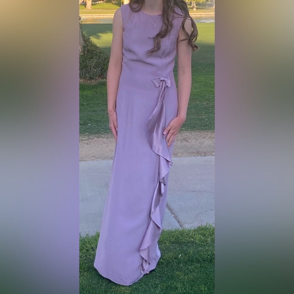 Elegant Lavender Gown with satin bow. Size S. Worn once. Excellent condition.